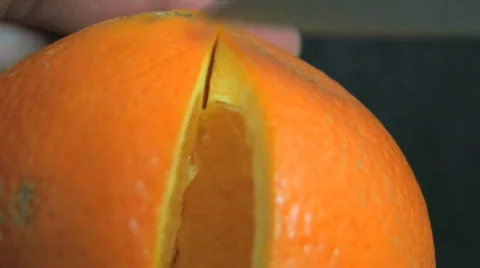 Cutting an Orange fruit HD Stock Footage 504920
