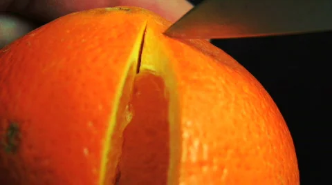 Cutting an Orange fruit HD Stock Footage 505001