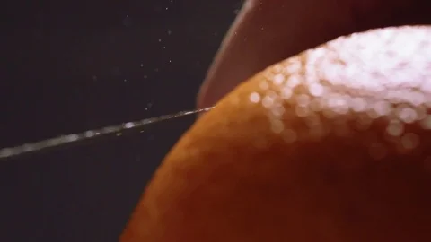 Cutting orange peels for garnish Stock Footage 83862554