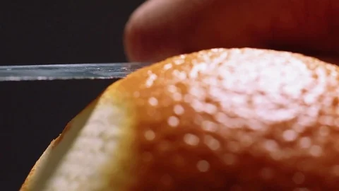 Cutting orange peels for garnish Stock Footage 83862566