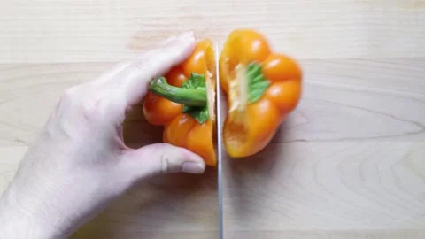 Cutting orange pepper Stock Footage 281905715