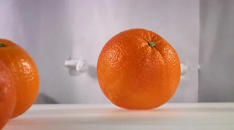 Cutting an orange into wedges Stock Footage 8570405