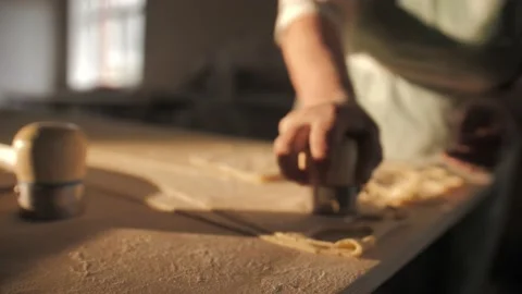 Cutting out circles from raw dough. 動画素材 168534113