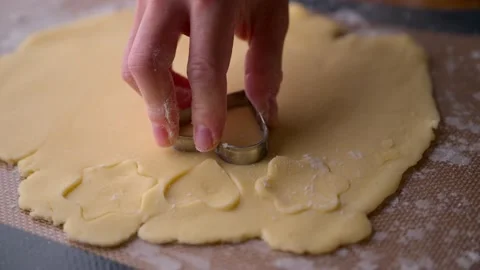 Cutting out cookie dough with hands Stock-Footage 217388664