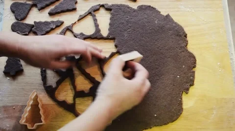 Cutting out gingerbread dough time lapse. Traditional Christmas cookies Stock Footage 55126633