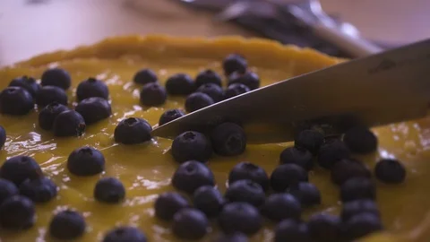 CUTTING out a piece of cheesecake Stock Footage 90159094