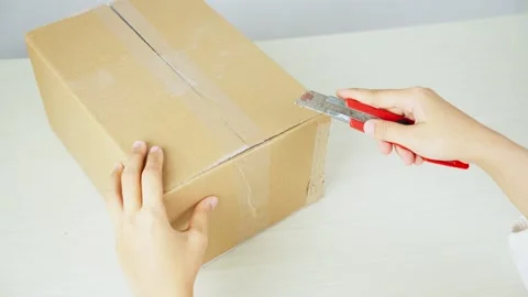 Cutting Package Tape With Utility Cutter Video stock 347178879