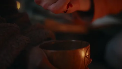 Cutting Palm and Adding Blood to Ritual Cup for Evoking Demons Видео 279636220