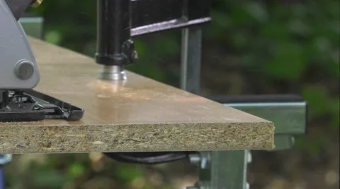 Cutting a panel with a circular saw Video stock 63505467