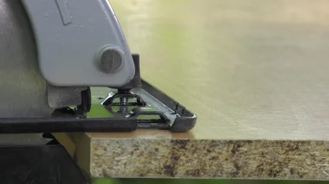 Cutting a panel with a circular saw Video stock 63505741