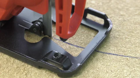 Cutting a panel with a jigsaw Stock Footage 63506061