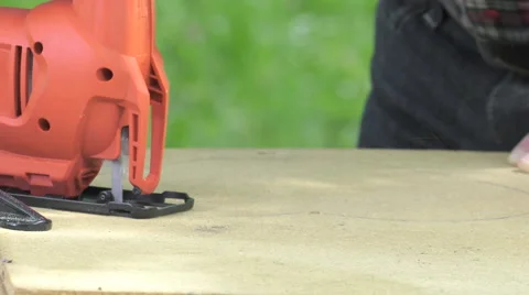 Cutting a panel with a jigsaw Video stock 63506552