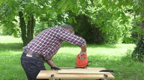 Cutting a panel with a jigsaw Video stock 63506859