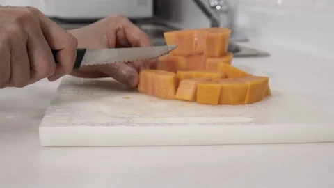Cutting a Papaya fruit. Stock Footage 77737940