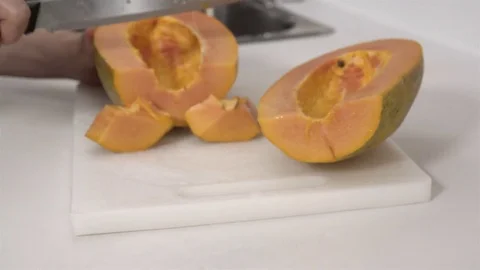 Cutting a Papaya fruit. Stock Footage 77738557