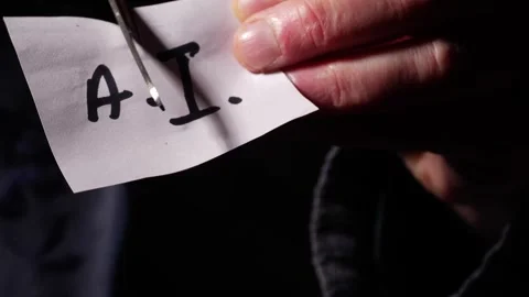 Cutting paper on artificial intelligence in protest Stock Footage 268809424
