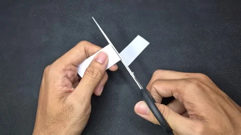 Cutting paper Stock Footage 294956667