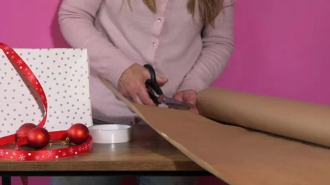 Cutting paper for gift wrapping Stock Footage 160925030