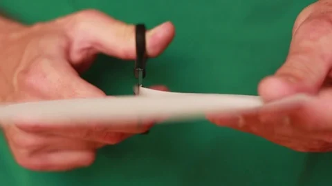 Cutting paper with scissors closeup 動画素材 74292205