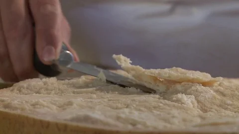 Cutting the Parmesan cheese flakes Stock Footage