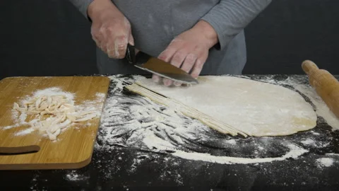 Cutting pasta from dough Video stock 172974412