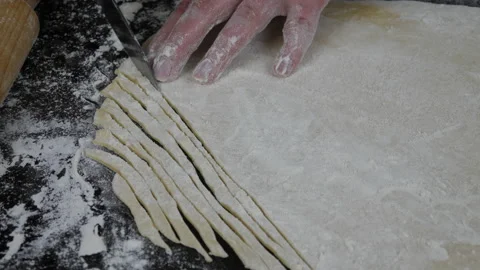 Cutting pasta from dough Video stock 172994020