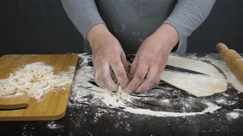 Cutting pasta from dough Video stock 172994697