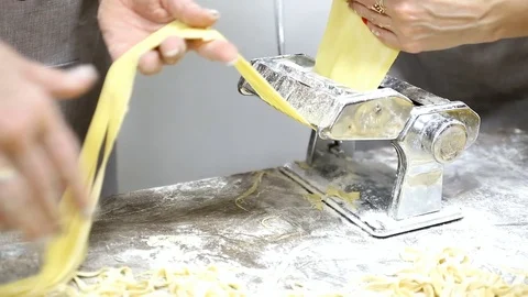 Cutting pasta on a machine Stock Footage 86987723