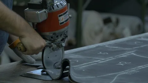 Cutting Pattern in Fabric Stock Footage 100852127