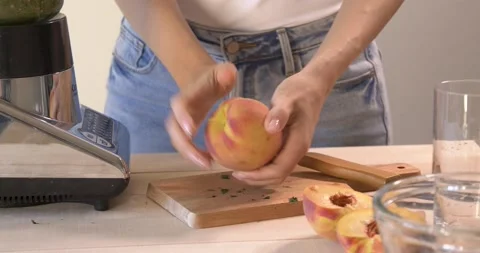Cutting peach Stock Footage 148185339