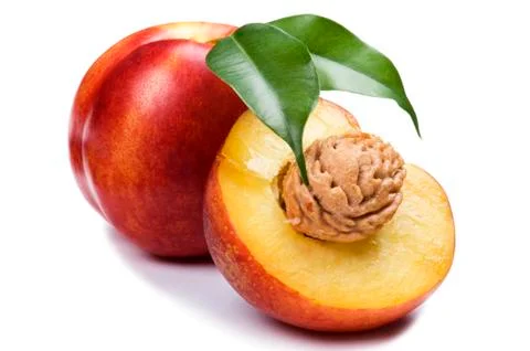 Cutting peach on white Stock-Fotos