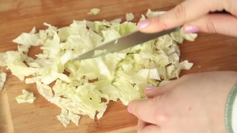 CUTTING PEEKING CABBAGE Stock Footage 155653365
