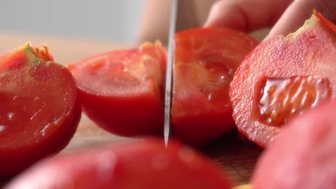 Cutting Peeled Tomato on Board. Stock Footage 255664401
