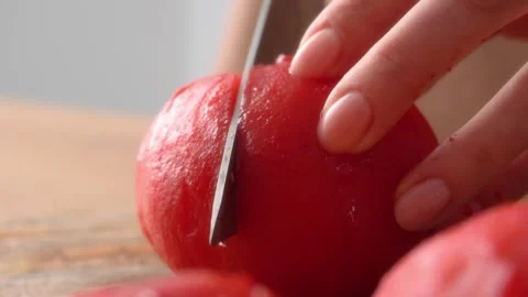 Cutting Peeled Tomato on Board. Stock Footage 255664459