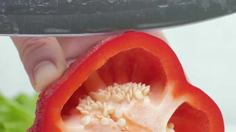 Cutting pepper on board with chef hands. Close up Stock Footage 88335613