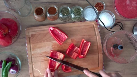 Cutting Pepper On Cutting Board For Juicing Stock Footage 220349967