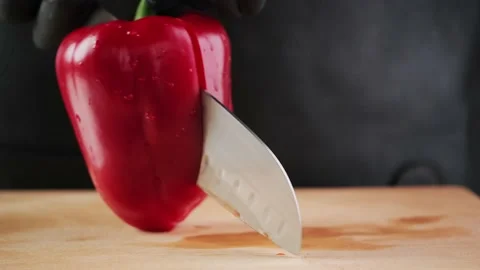 Cutting pepper with a knife. Cutting vegetables Stock Footage 151644731