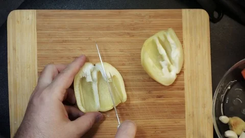 Cutting pepper overhead Stock Footage 98360672