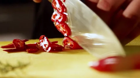 Cutting the pepper in slow motion Stock Footage 67857408