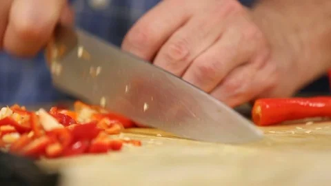 Cutting Peppers Close Up on Cutting Board Stock Footage 81276802