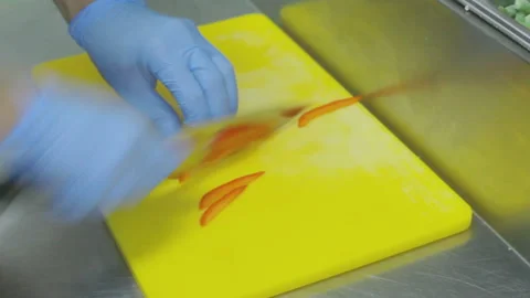 Cutting the peppers cook. Stock Footage 93368531
