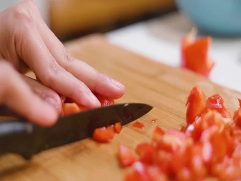 Cutting peppers on a cutting board Stock Footage 80545778