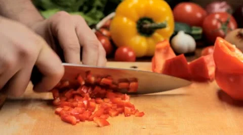 Cutting peppers - tracking shot Stock Footage 12721612