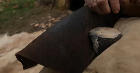 Cutting a pice of silex for knife Stock-Footage 61264312