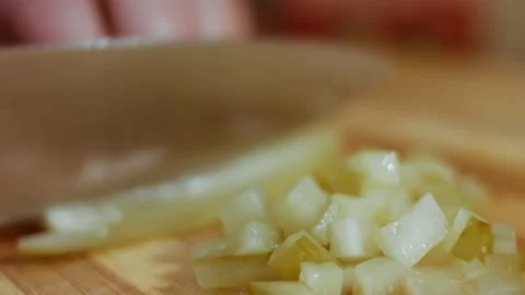 Cutting pickled cucumber for olive salad, Russian salad Stock Footage 144435087