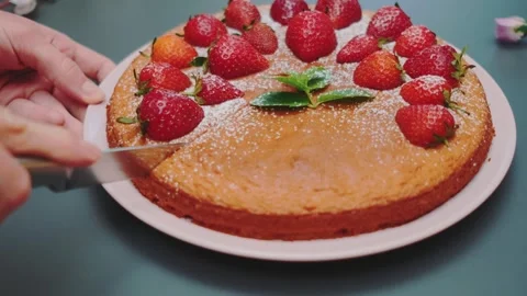 Cutting the pie with a knife into portions Stock Footage 249257586
