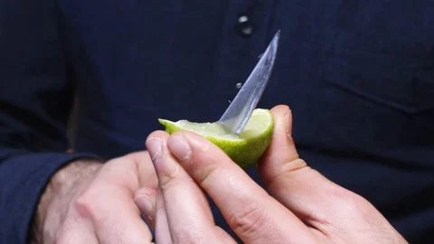 Cutting piece of lime Stock Footage 129084103