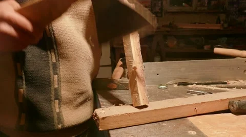 Cutting up a Piece of Wood with an Axe Stock Footage 58680958