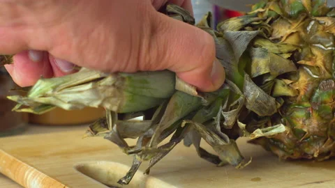 Cutting pineapple on cutting board, close-up Stock Footage 145278853