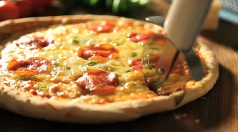 Cutting pizza Stock Footage 5040987
